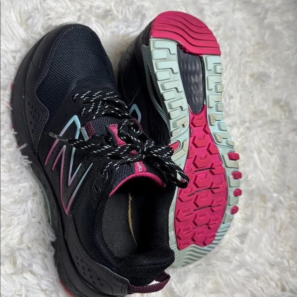 New Balance Black Sneakers with Pink Highlights